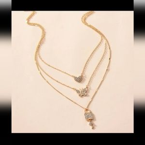 Gold Layered Rhinestone Heart, Butterfly, Lock & Key Necklace
